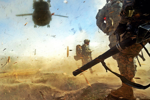 PAKTIKA PROVINCE, Afghanistan -- Paratroopers from 3rd Platoon, Company B, 3rd Battalion, 509th Parachute Infantry Regiment, 4th Brigade Combat Team, 25th Infantry Division prepare to load a CH-47 Chinook Helicopter in the Bermel District of the Paktika province in eastern Afghanistan, Oct. 13, during an air-assault mission to detain a known militant. (Photo by U.S. Army Pfc. Andrya Hill, 4th Brigade Combat Team, 25th Infantry Division Public Affairs)
